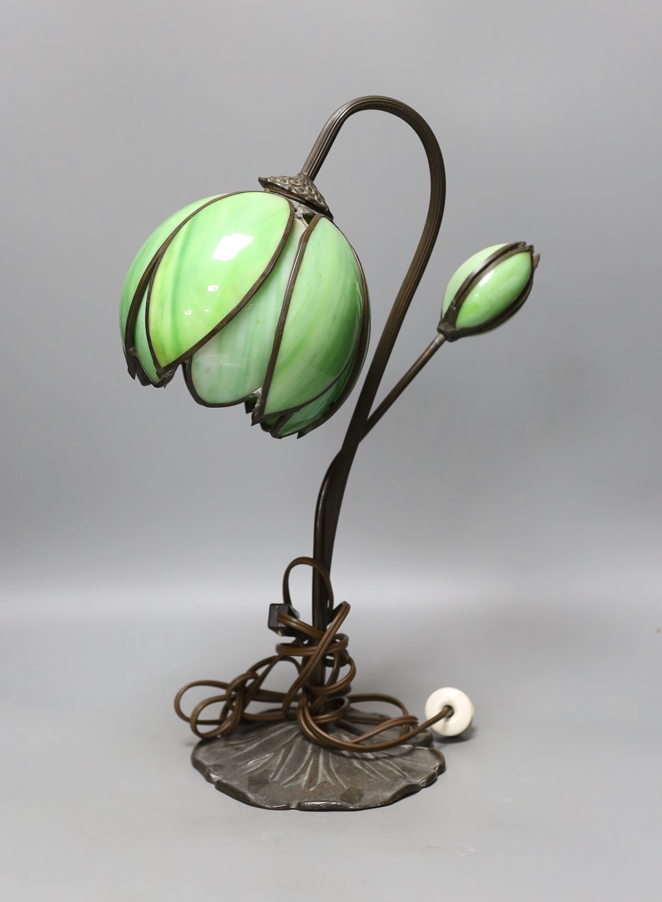 A green glass and metal, Tiffany style tulip lamp, 42cm high